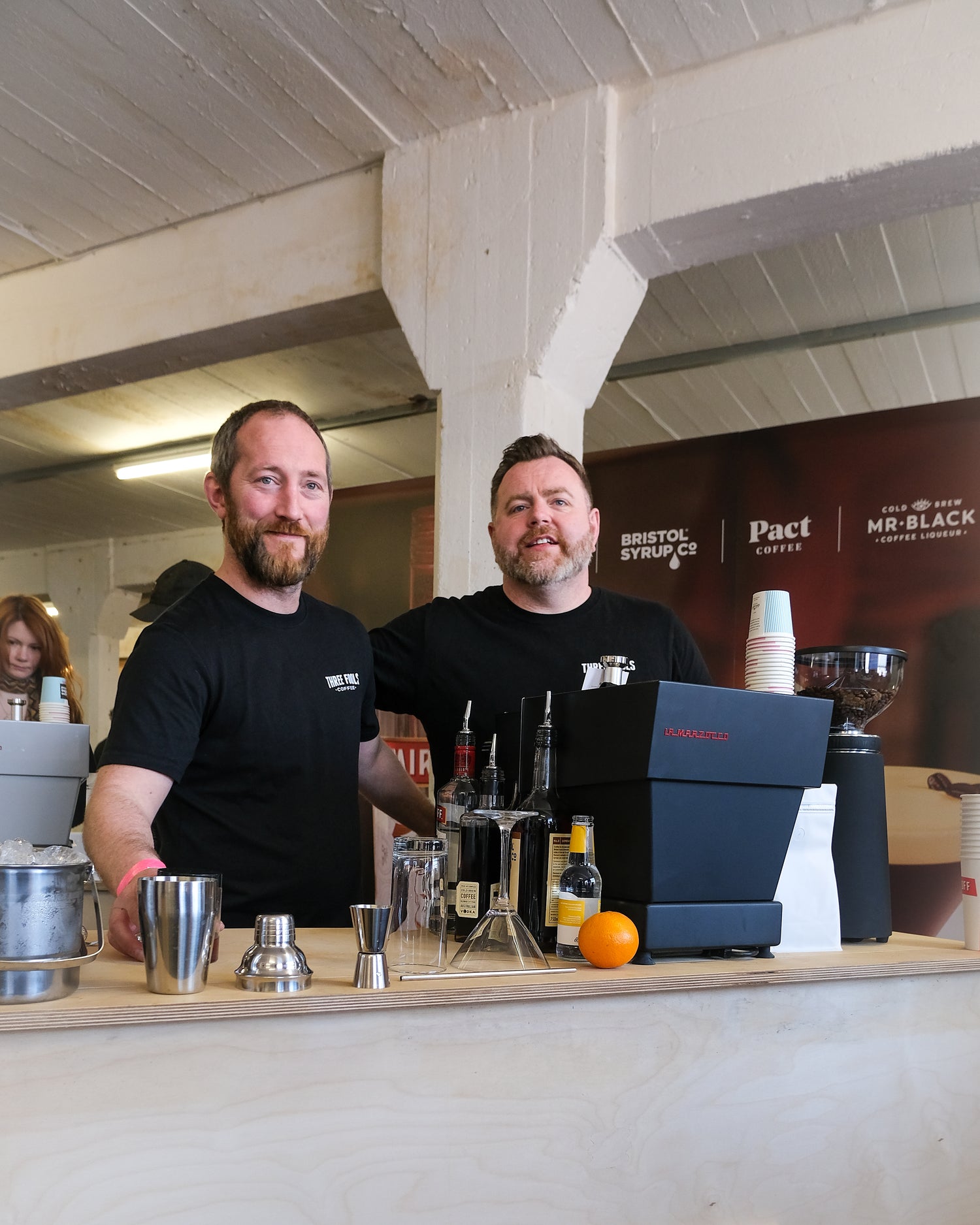 Three Fools Founders in cafe smiling